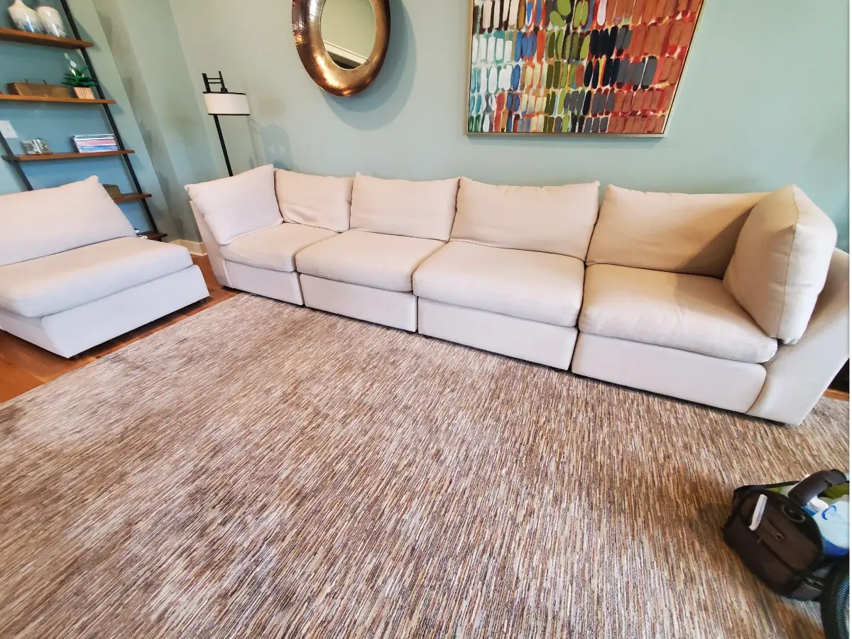Sofa steam cleaning before and after in Kansas City — upholstery stains lifted from the cushions